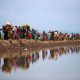 FILE PHOTO:  Rohingya refugees continue their way after crossing from Myanmar into Palang Khali, near Cox's Bazar, Bangladesh November 2, 2017. REUTERS/Hannah McKay/File Photo